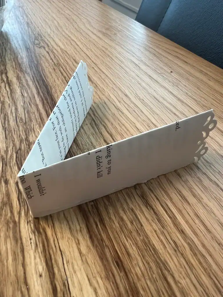 Folded book page ready to use for a DIY wreath